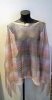 Rosa randig poncho. Bit'avant