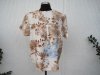 Blommig viskosblus med kort ärm. Natur beige