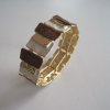 Elastiskt Armband Brunt Guld