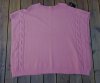 Rosa stickad poncho