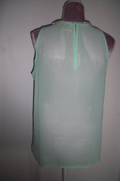 Mintgrön ärmlös blus