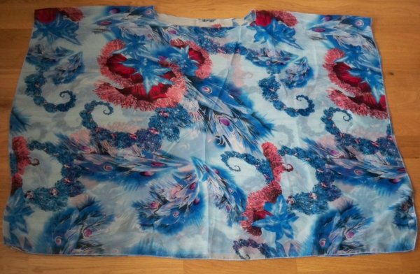Blå mönstrad blus/poncho. Bit'avant
