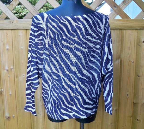 Stickad tröja Zebra